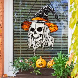 Detailed close-up of Halloween stained glass skeleton witch hanging decoration for festive home.