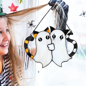 Halloween stained glass ghost hanging ornament scene detail showing festive spooky home decor.