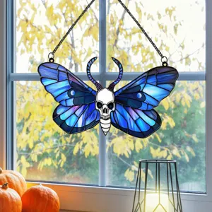Stained glass skull moth window hanging, Gothic Halloween decor with hanging chain detail.