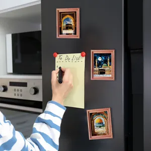 Detailed shot of Islamic architectural fridge magnets on fridge door, wooden magnetic decor.