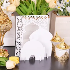 Detailed view of white acrylic mosque decor set with gold lanterns for Ramadan and Eid celebrations.