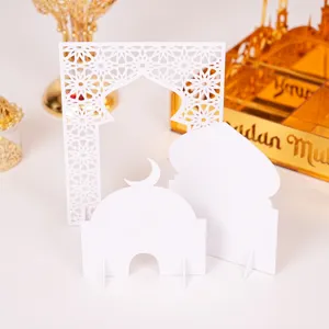 White acrylic Ramadan Mubarak decoration set with mosque arch and moon shapes for table.