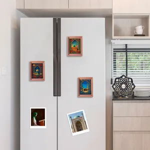 Detailed close-up view of Middle Eastern Islamic architecture fridge magnets on a white fridge.