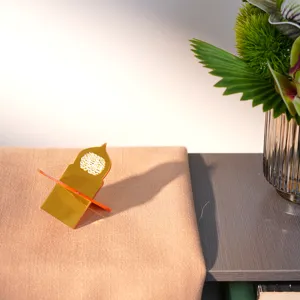 Gold acrylic arch desktop stand holder for dates, biscuits, or small books home decor.