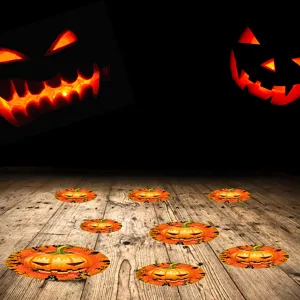 Halloween pumpkin stickers detail view showing scary jack o lantern floor decals for spooky party decor.