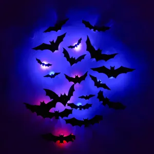 3D Halloween LED bat wall stickers, glowing night light for party window and home decor.
