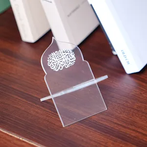 Clear acrylic book display stand with Arabic calligraphy design for table decoration use.