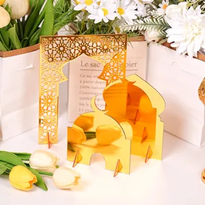 Gold acrylic Middle Eastern architecture mosque tabletop ornament set for festive home decor.