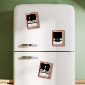 Detailed view of Middle Eastern architectural wooden fridge magnets on refrigerator.