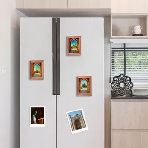 Middle Eastern style architectural wooden photo frame fridge magnets detail view in kitchen scene.