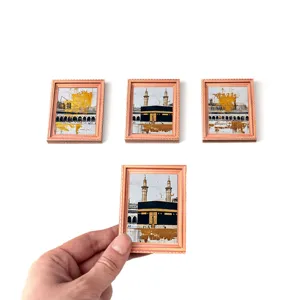 Detail view of miniature wooden photo frame fridge magnet featuring Middle Eastern mosque architecture.