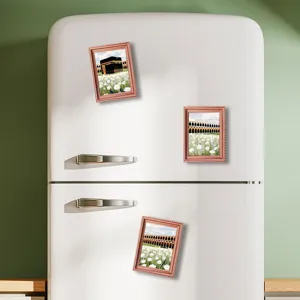 Middle Eastern style wooden picture frame fridge magnets with Islamic architecture prints.