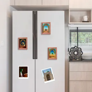 Detailed view of Middle Eastern architecture wooden photo frame fridge magnets on a fridge.