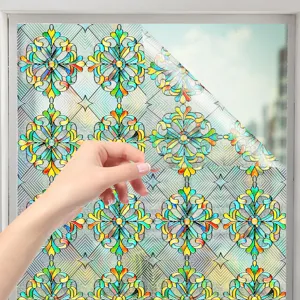 Detailed shot of 3D embossed stained glass window film with colorful floral static cling.