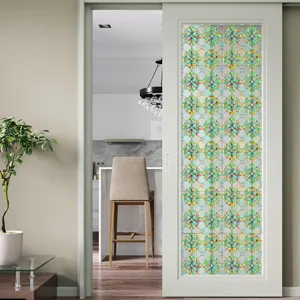 Detail shot of colorful floral 3D embossed static cling window film applied on glass door.