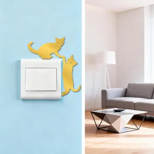 Gold acrylic mirror cat wall sticker detail view showing switch decor in living room.