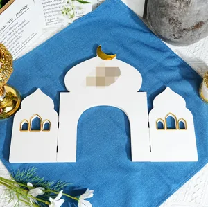 Middle Eastern style architectural desktop ornament with golden crescent and windows for party decor.