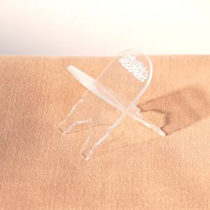 Transparent acrylic book stand with Arabic calligraphy for desktop decoration and display.