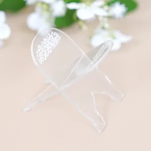 Clear acrylic Quran stand detail, portable book holder for desktop display and reading use.