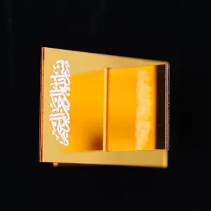 Gold acrylic scripture and date holder stand featuring elegant Arabic calligraphy desktop decor.