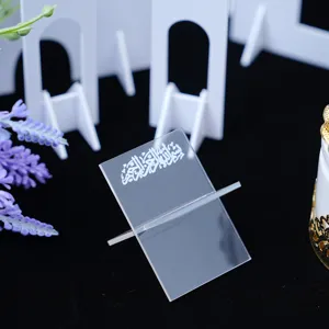 Clear acrylic book stand with Arabic calligraphy for desktop decoration and display.