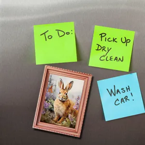 Close-up of Easter rabbit wooden photo frame magnet, detailed texture and cute design.