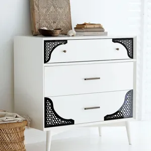 Adesivi decorativi angolari in acrilico, design a stella geometrica nera per mobili e pareti.