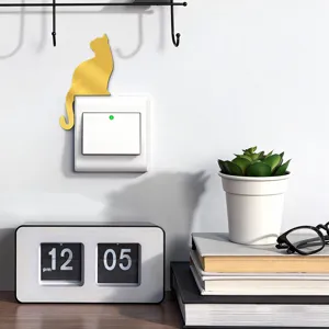 Gold acrylic cat wall switch sticker detail scene showing cute home decor style.