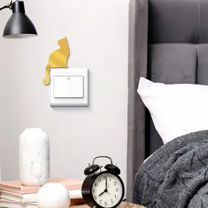 Gold mirror acrylic cat wall switch sticker, cute animal decor for home bedroom interior.