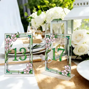 Acrylic table number sign with floral stained glass border, perfect for wedding party table decor.