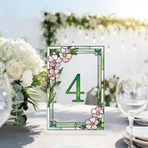 Detailed view of stained glass floral acrylic table number sign 4 for wedding party decor.