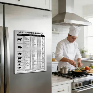 Detail view of a metal meat smoking guide magnet attached to a kitchen stainless steel refrigerator.