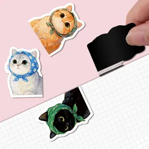 Close-up of cute cat magnetic bookmarks showing back design and magnetic closure feature.