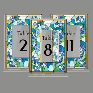 Acrylic table numbers for wedding reception, blue floral stained glass style decor.