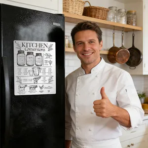 Kitchen conversion chart magnet for refrigerator with clear cooking measurement tables.