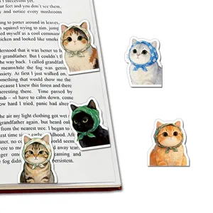 Cute cat magnetic bookmarks detail showing headscarf cat designs on open book for reading.