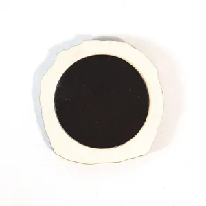 Detailed close-up view of the wooden magnetic fridge sticker back, showing strong round magnet.