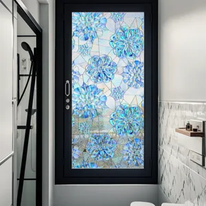 Close-up detail showcasing the blue 3D embossed stained glass window film applied on bathroom window.
