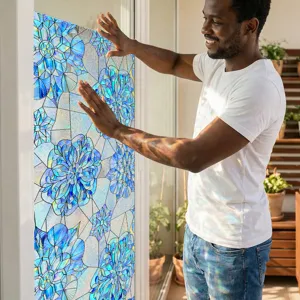 Detailed view of 3D embossed blue floral static window film, perfect for home decor glass.