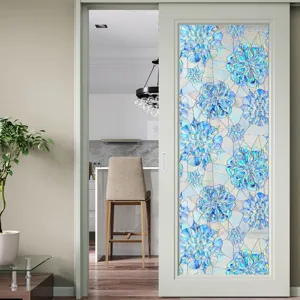 Close-up detail of 3D embossed floral static window film applied on glass door for home decor.