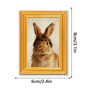 Detail view of the funny rabbit photo frame fridge magnet with golden wood texture.