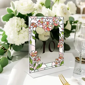 Detailed view of the stained glass floral acrylic table number card for wedding decor.