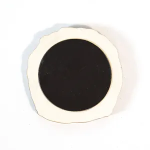 Wooden refrigerator magnet detail view showing smooth natural wood texture and magnetic backing pad.