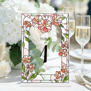Acrylic table number sign with floral stained glass design for wedding party table decor.