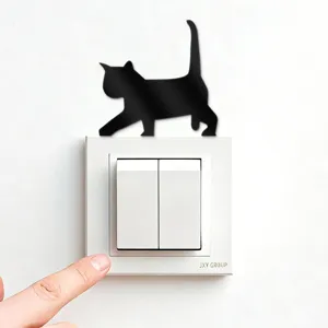 Black acrylic mirror cat wall sticker detail showing cute walking silhouette on switch.
