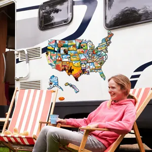 Detailed scene view showing the USA map fridge magnet puzzle displayed on an RV exterior wall.