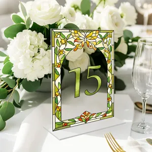 Exquisite stained glass style acrylic table number sign detail, perfect for wedding party decor.