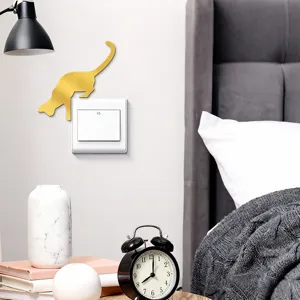 Gold acrylic mirror cat switch wall sticker, cute home decor for bedroom and living room.