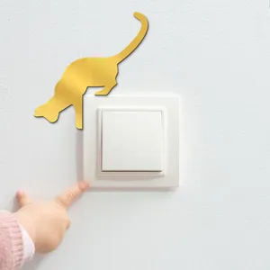 Gold acrylic mirror cat switch sticker detail shot showing wall decoration usage.