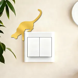 Gold acrylic mirror cat wall sticker for light switch home decor, creative wall art decal.